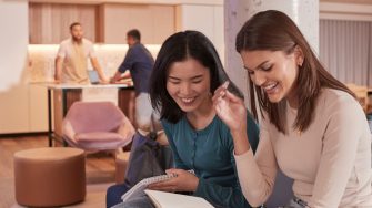 Students relaxing and studying in the common lounge at UNSW Kensington accommodation.
