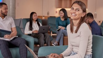 Students relaxing and studying in the common lounge at UNSW Kensington accommodation.