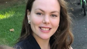 Anna Molony is smiling for the camera