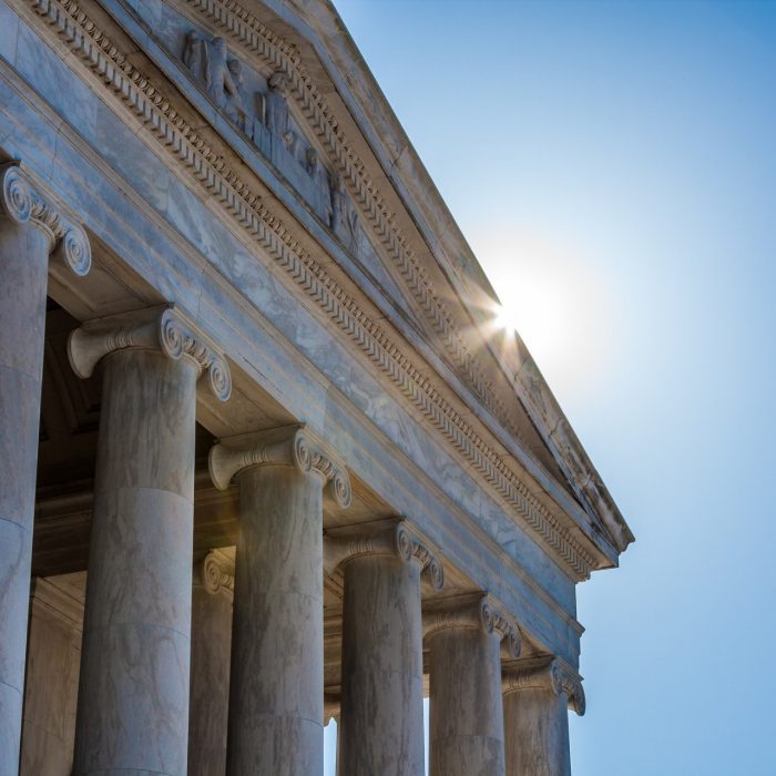 closeup of gable on Jefferson Memorial with sunburst on the edge