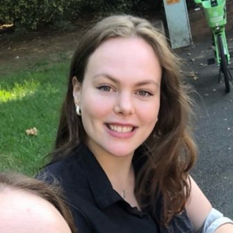 Anna Molony is smiling for the camera