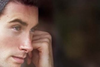 Young white male with hat