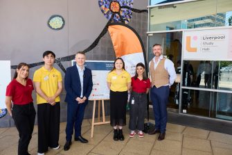 Federal Education Minister Jason Clare (centre) and UNSW Vice-Chancellor and President Professor Attila Brungs (right) with students at the Liverpool Study Hub.