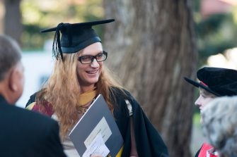 Images of students in their graduation outfits on the UNSW campus