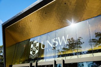 Students and family celebrate graduation.