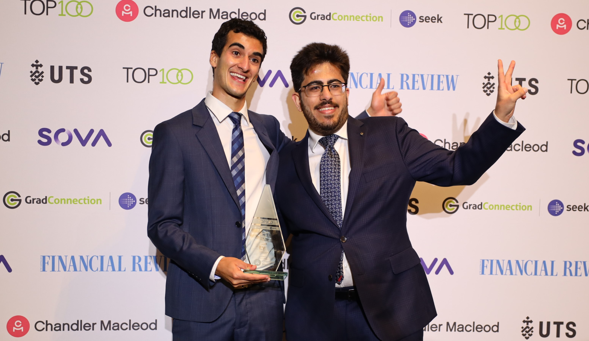 EY Top100 Future Leader Award winners Emanuel Shavier and Himanshu Singh accept their award at the 2024 AFR Top110 Future Leaders Award night