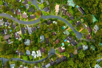 Aerial view of Suburban roof tops directly above