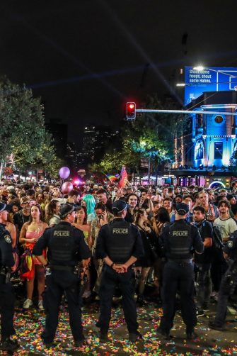 BYRON BAY, AUSTRALIA - JULY 22:  Police officers and drug detection dogs walk amongst festival goers before entering Splendour in the Grass 2016 on July 22, 2016 in Byron Bay, Australia.  (Photo by Mark Metcalfe/Getty Images)