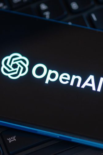 SearchGPT page seen on the smartphone and official OpenAI company logo on background. New AI search tool. 