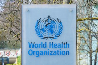 sign and logo of The World Health Organization (WHO/OMS) and UNAIDS