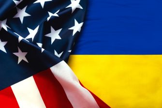 American flag and National flag of Ukraine background