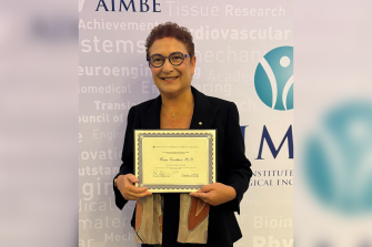 Professor Maria Kavallaris with her AIMBE award