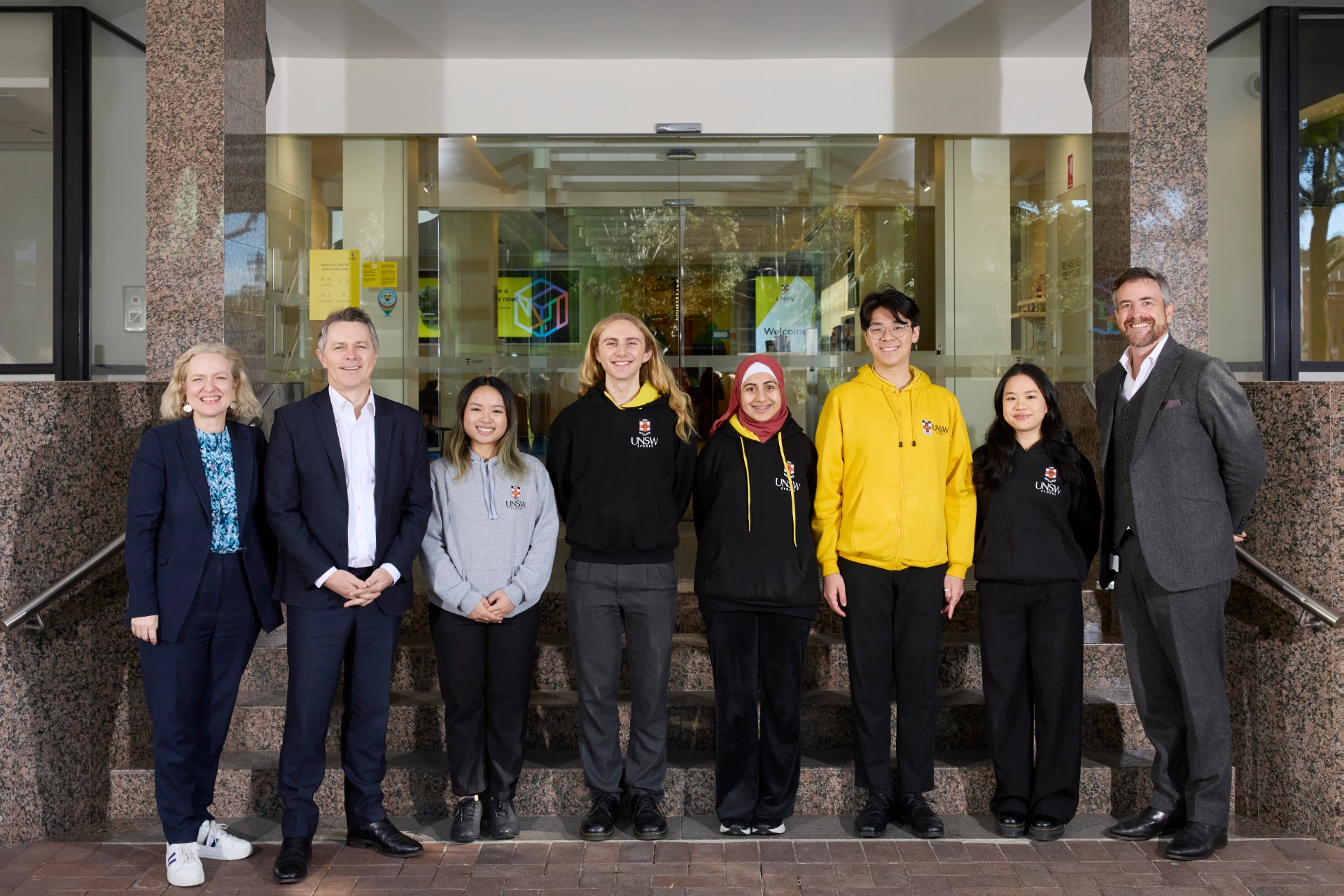 Professor Verity Firth AM, UNSW Vice-President Societal Impact, Equity & Engagement, Federal Minister for Education Jason Clare, students Celina Nguyen, Sam North, Roba Goreishi, Eamonn Lee, Catherine Duong and UNSW Vice-Chancellor and President Professor Attila Brungs outside The Chancellery, where they discussed UNSW’s Gateway Program. 