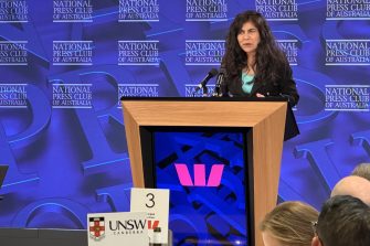 Veena speaking at the National Press Club