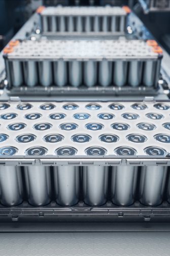 EV Battery Production Factory. Close-up of Lithium-ion High-voltage Battery Components for Electric Vehicle or Hybrid Car. Battery Module for Automotive Industry Production Line.