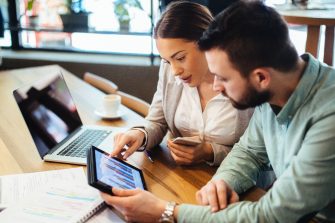 Two creative business partners discussing new business ideas