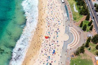Wide angle view of Coogee Beach along Sydney Eastern Beaches in summer.