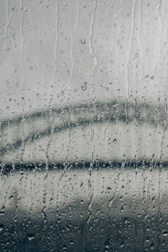 Heatwave on the city with the glowing sun background. Heatwave concept