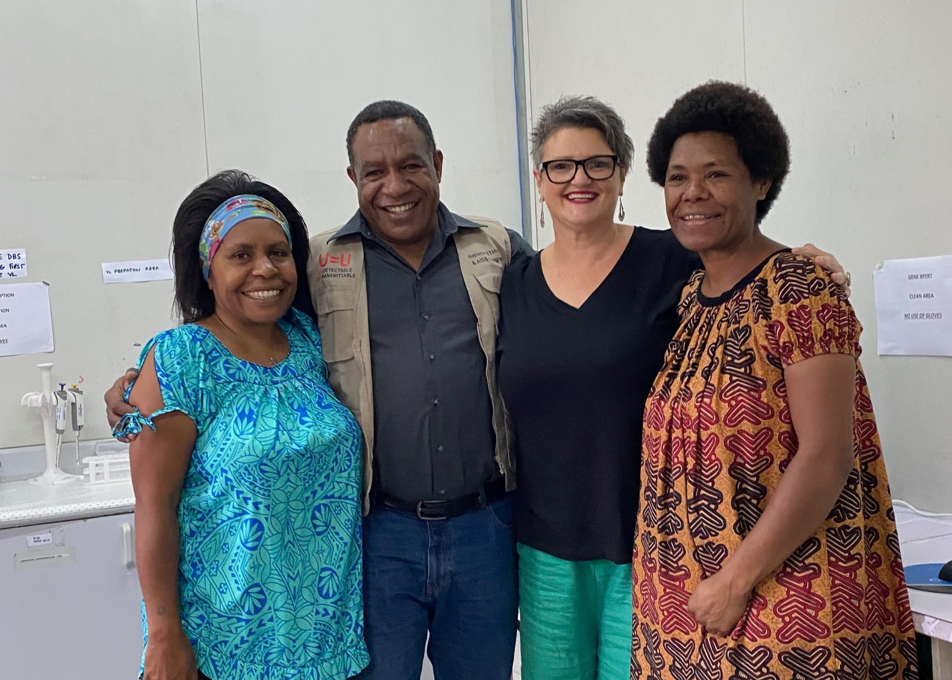 Angela Kelly-Hanku ad ACT-UP PNG colleagues 