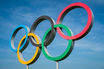 Olympic rings against a blue sky