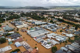 A road traffic sign flooded underwater