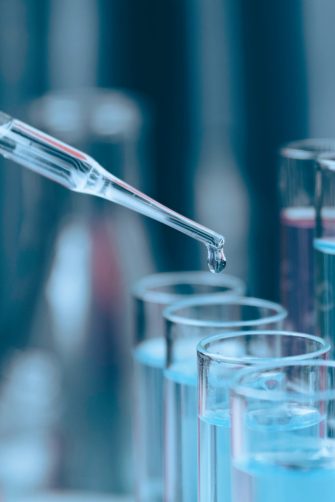 Chemical test tubes with liquid for analytical , medical, pharmaceutical and scientific research concept.