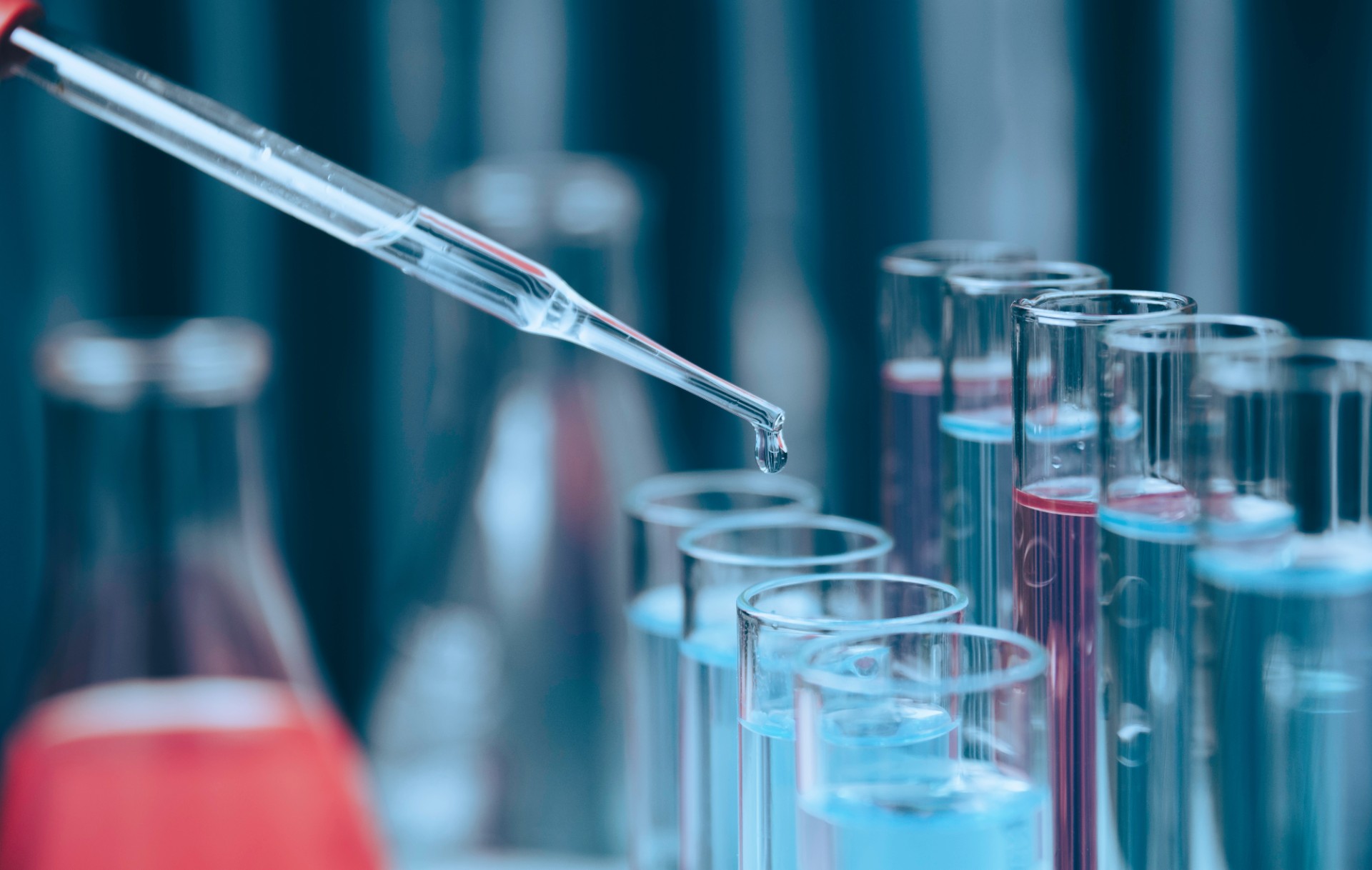 Chemical test tubes with liquid for analytical , medical, pharmaceutical and scientific research concept.