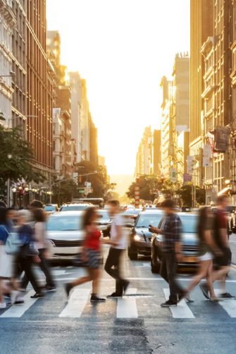 Two people with the business suit walking on waterside street that belongs to Brisbane City, Queensland, Australia.