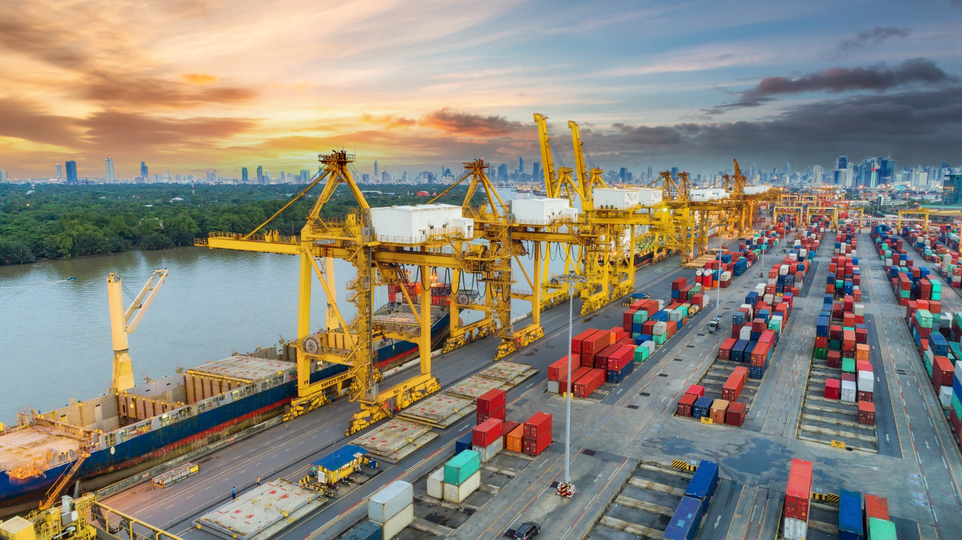 Aerial view container ship from sea port warehouse waiting for delivery containers shipment. Suitable use for transport or import export to global logistics concept.