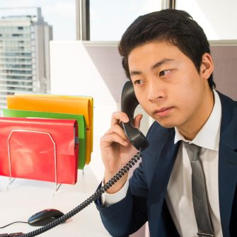 Photograph of office workers working
