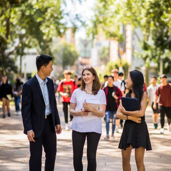 Students walking down the UNSW main walkway
