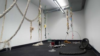 Mixed media installation with ropes, found objects, and beach debris in a gallery space. Created as part of UNSW Art & Design student work for the Tim Olsen Drawing Prize 2022.