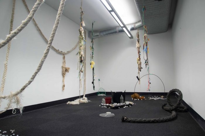 Mixed media installation with ropes, found objects, and beach debris in a gallery space. Created as part of UNSW Art & Design student work for the Tim Olsen Drawing Prize 2022.