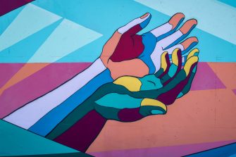 Purple, blue, red hands illustration
