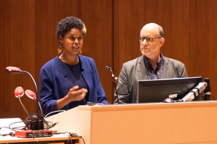 HELMS team presentation on stage at the John Clancy Auditorium UNSW Sydney