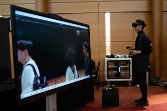 Person interacting with immersive digital experience1