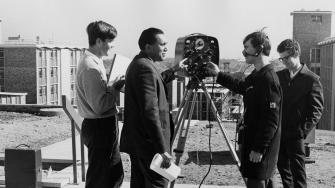 archive image of engineers using old theodolite