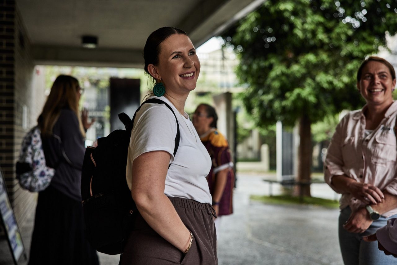 Woman standing  and smiling