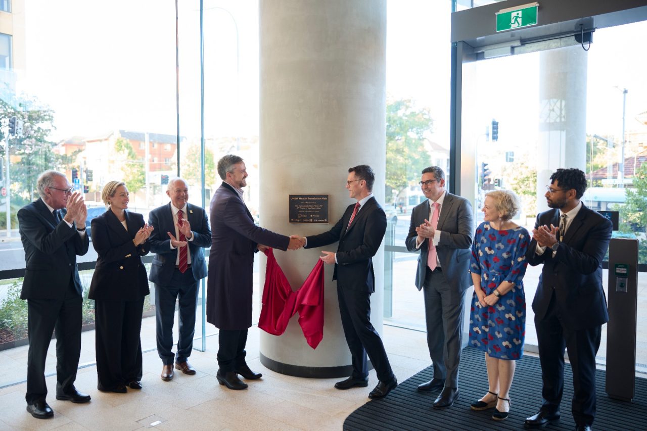 UNSW Vice-Chancellor and President Attila Brungs and NSW Premier Chris Minns shaking hands after the unveiling of the UNSW HTH plaque