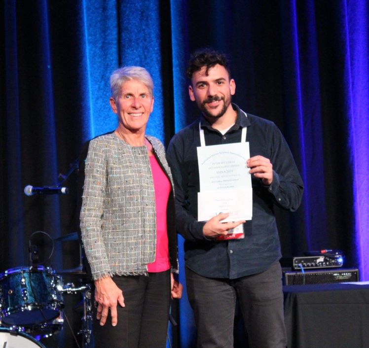 Carlos Rocha receiving award